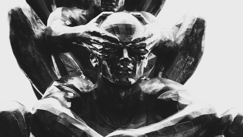 statue with hands on eyes