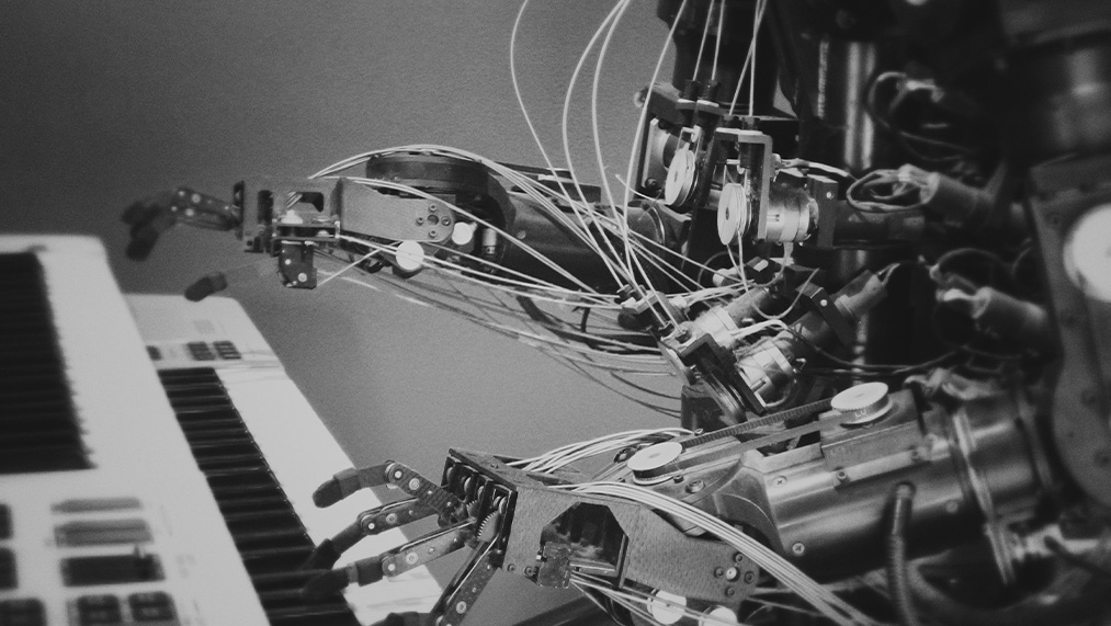 robot playing piano