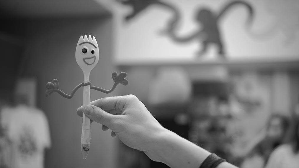 toy story spork with googly eyes and hands