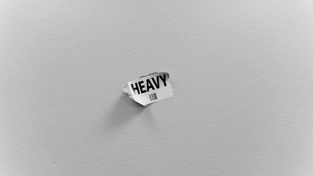 sticker on wall with text heavy