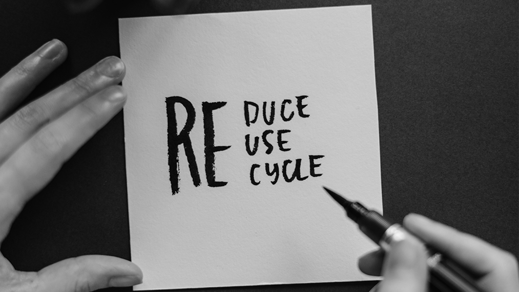 Paper saying 'Reduce, Reuse, Recycle'