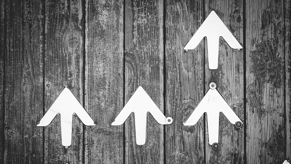 up arrows on wood