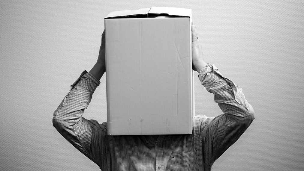 man with box on head