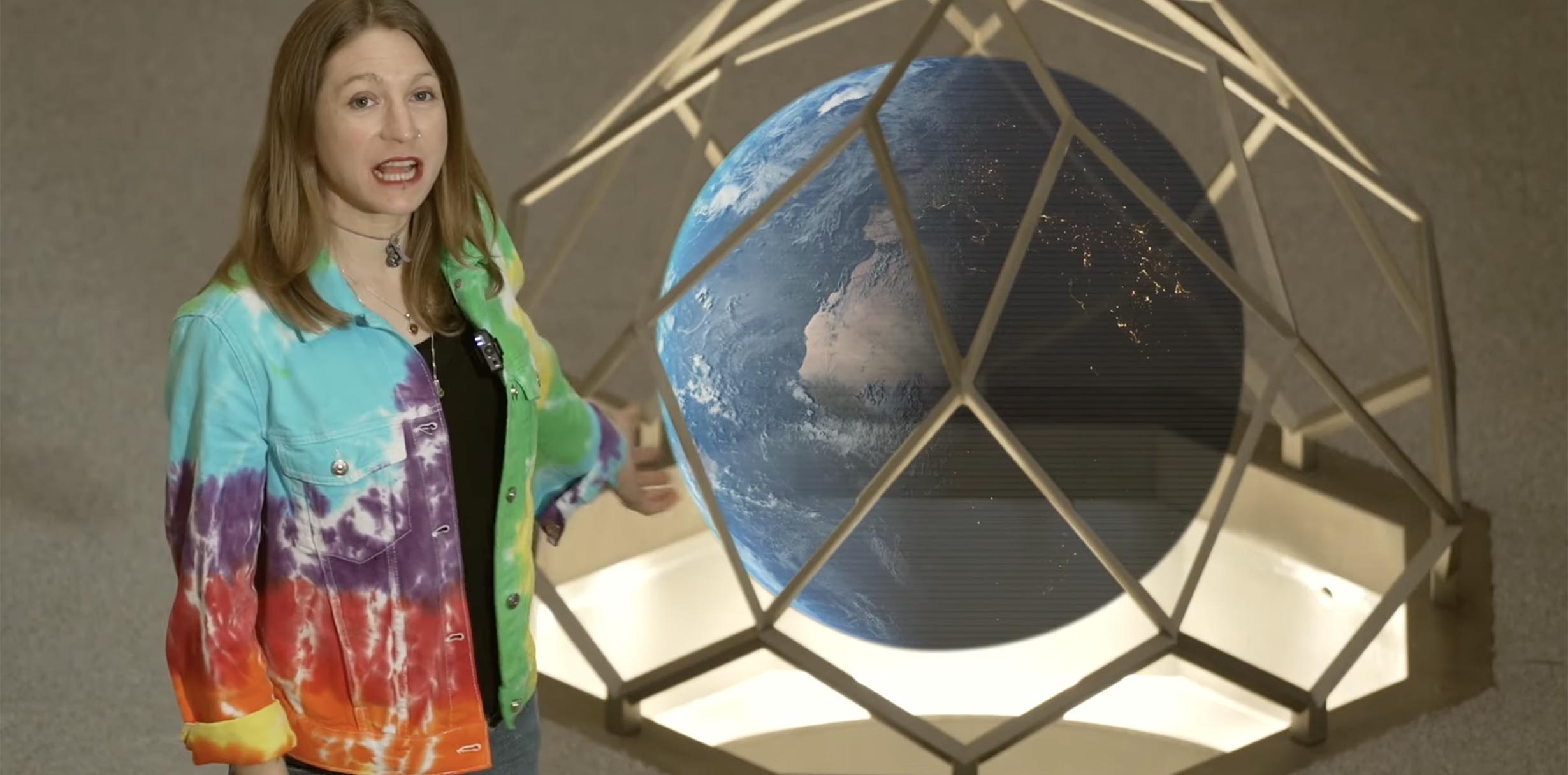 Video of an employee showing a globe
